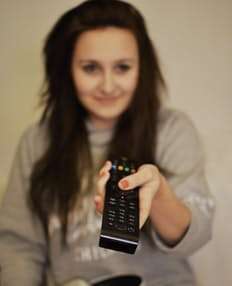 woman with remote